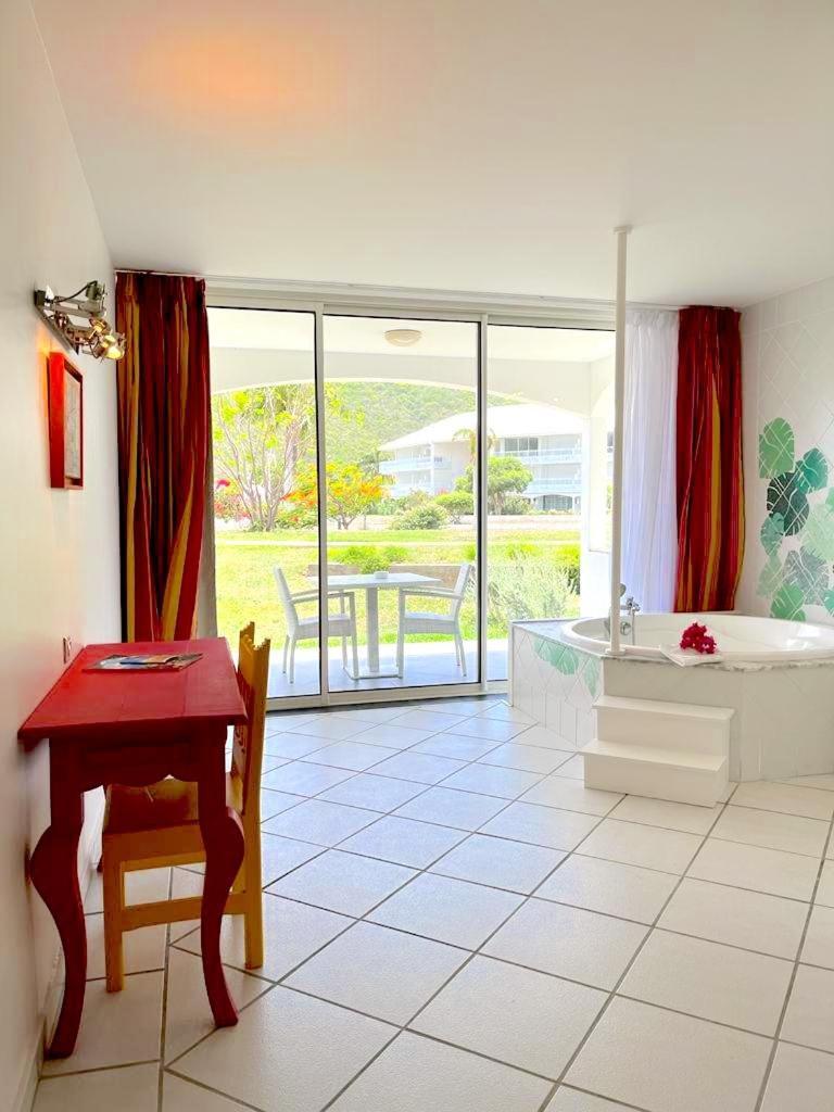 Le Domaine Anse Marcel Beach Resort Экстерьер фото